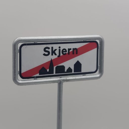 Personligt byskilt i miniature