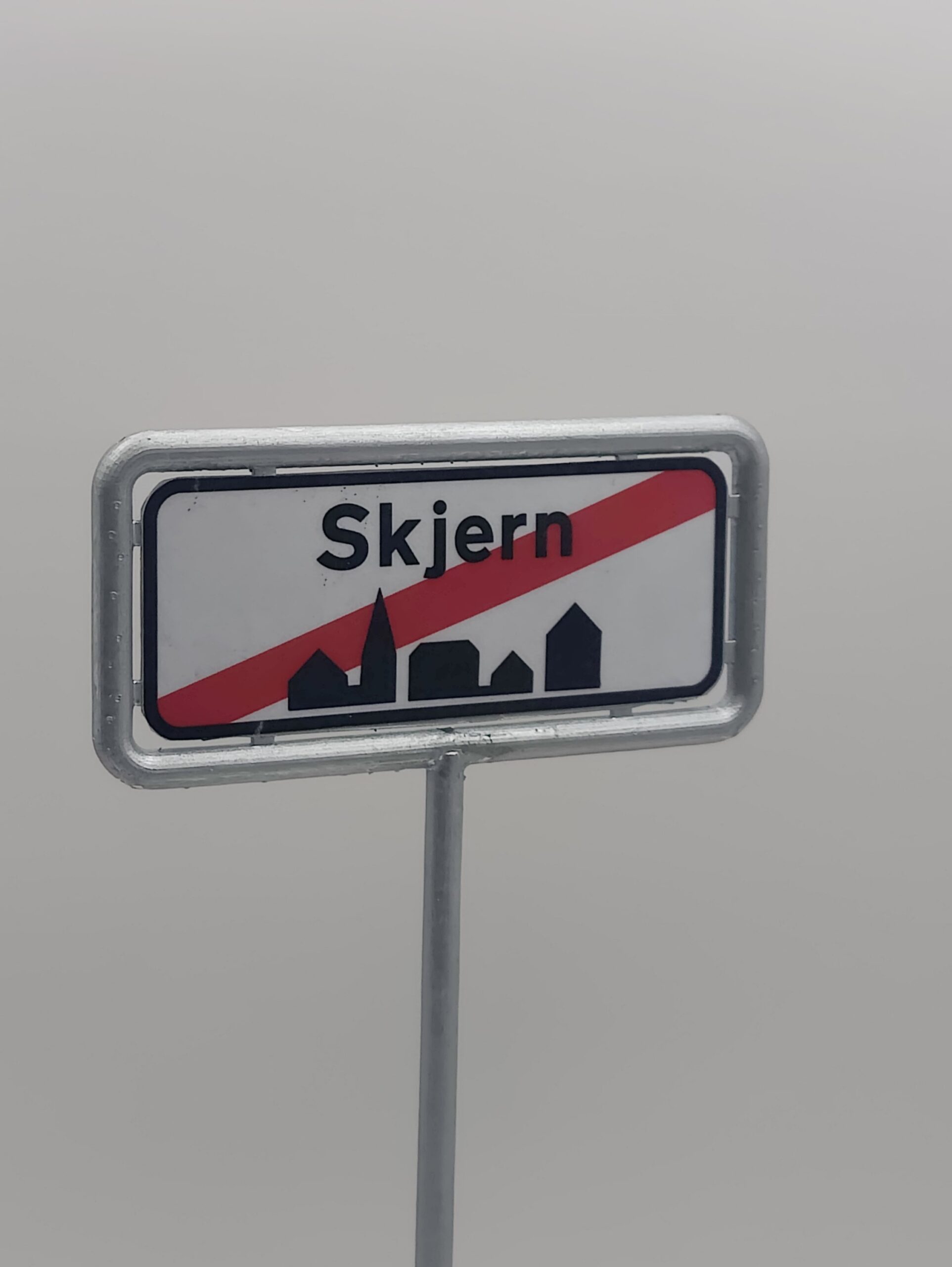 Personligt byskilt i miniature